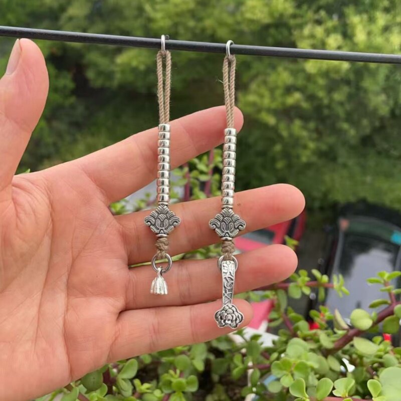 Fine Jewelry & Watches Photos - Paire d'accessoires suspendus en argent tibétain